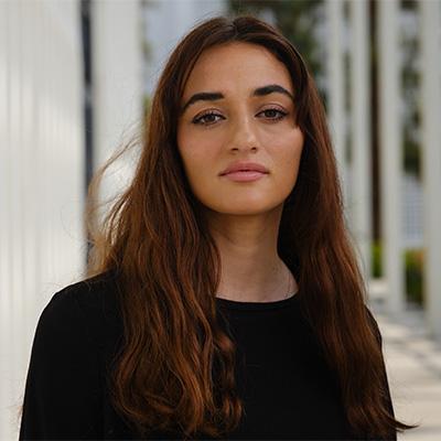 a woman posing for headshot